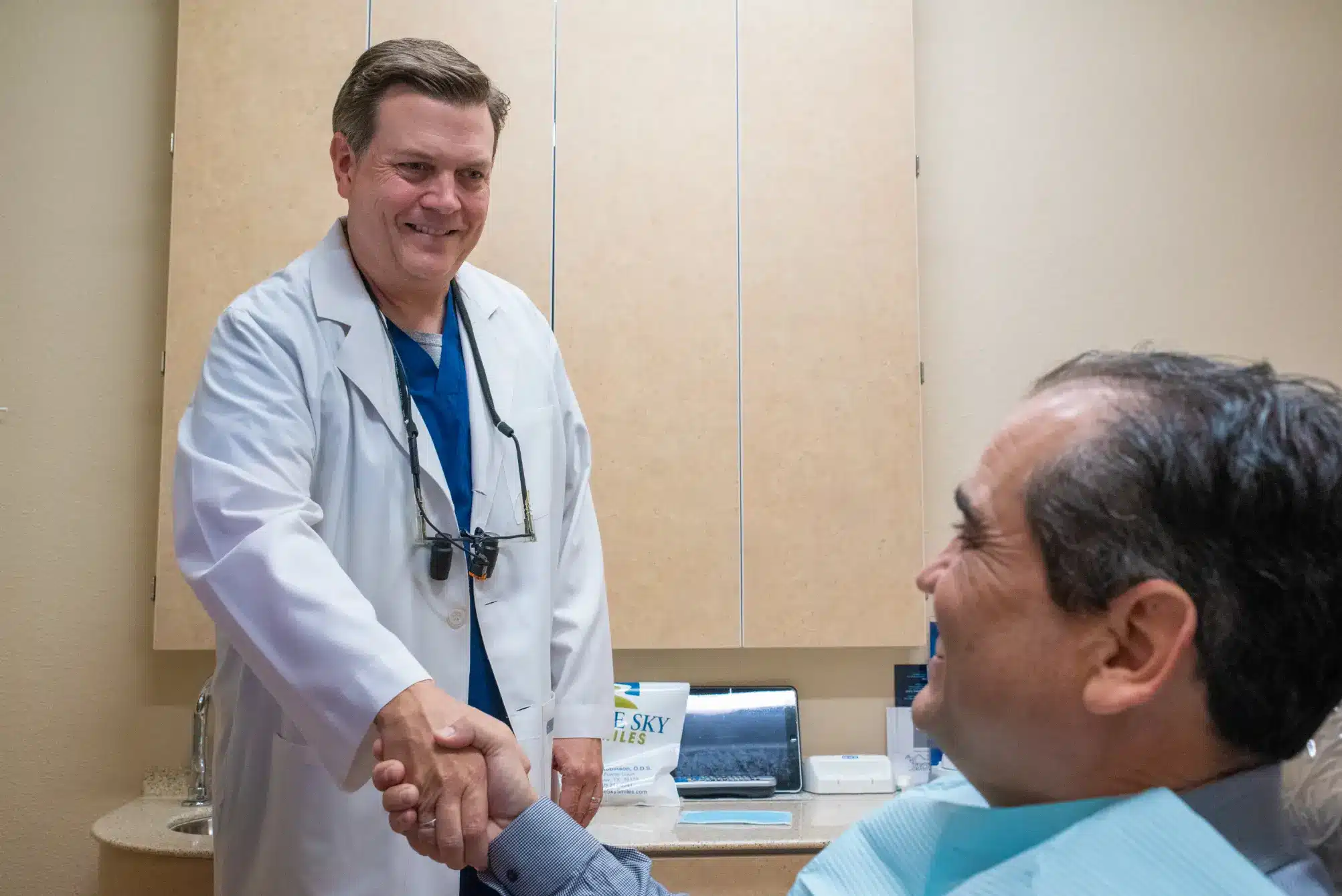 Dr. Robertson talking with a patient in Saginaw TX